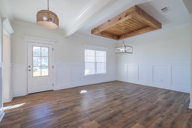 unfurnished dining area with beam ceiling, dark hardwood / wood-style flooring, and ornamental molding