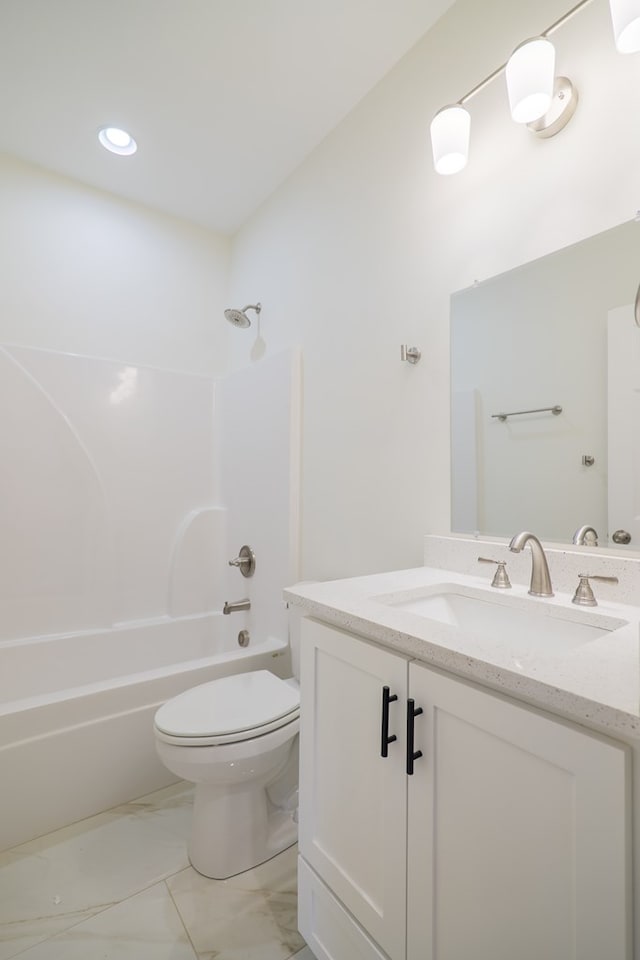 full bathroom featuring vanity, toilet, and bathtub / shower combination