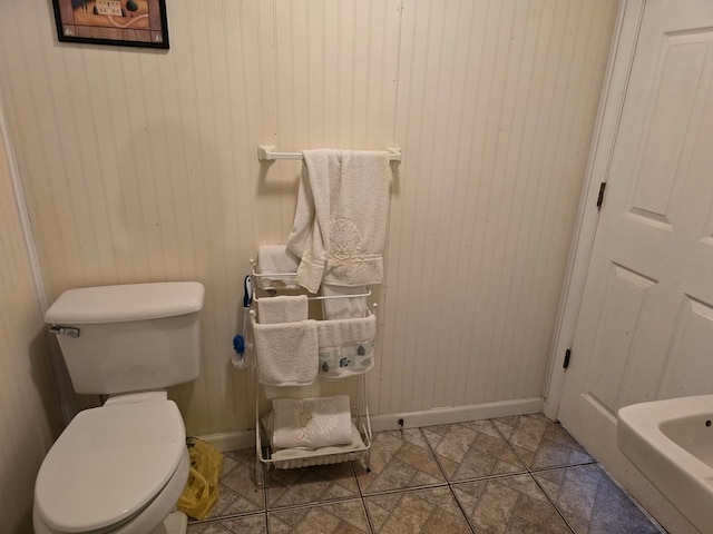 bathroom featuring toilet