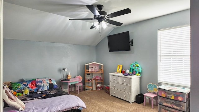 bedroom featuring light carpet, ceiling fan, and vaulted ceiling