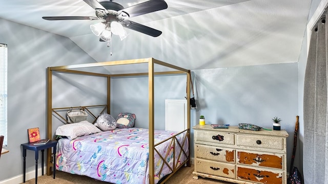 bedroom with lofted ceiling, carpet floors, and ceiling fan