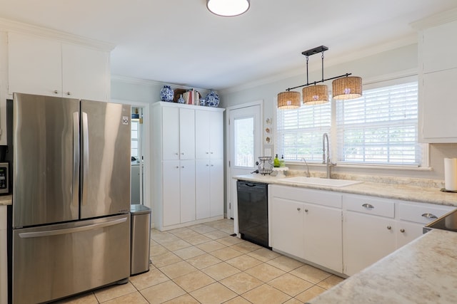 kitchen with crown molding, dishwasher, light countertops, freestanding refrigerator, and a sink