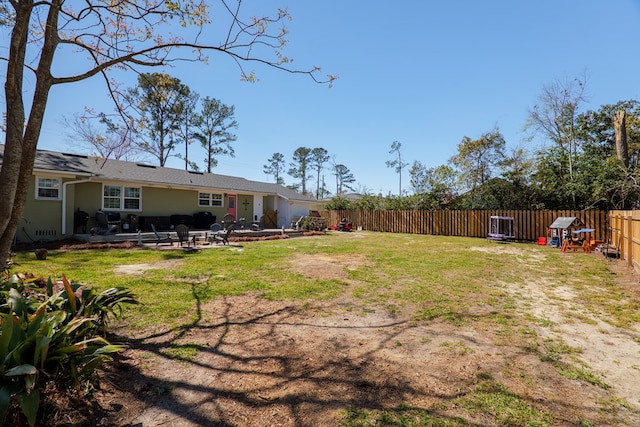 view of yard with a patio and a fenced backyard