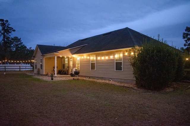 view of property exterior at dusk