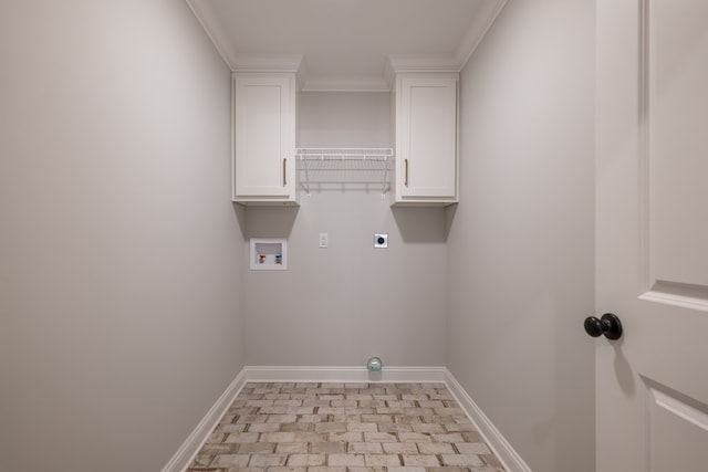 laundry room featuring hookup for an electric dryer, washer hookup, cabinets, and crown molding