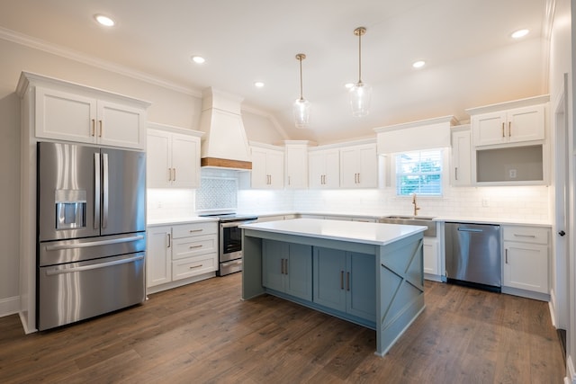 kitchen featuring white cabinetry, premium range hood, stainless steel appliances, and dark wood-type flooring