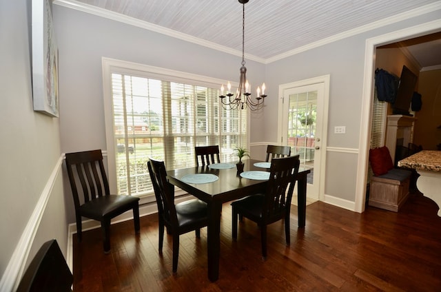 3854 Orchard Way, Valdosta, GA 31605 - dining area featuring a chandelier, dark wood-style floors, crown molding, and baseboards