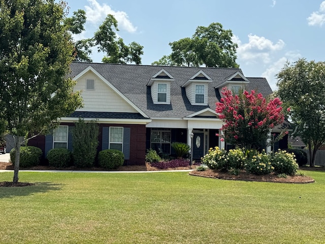 3854 Orchard Way, Valdosta, GA 31605 - view of front of home with a front yard and a shingled roof