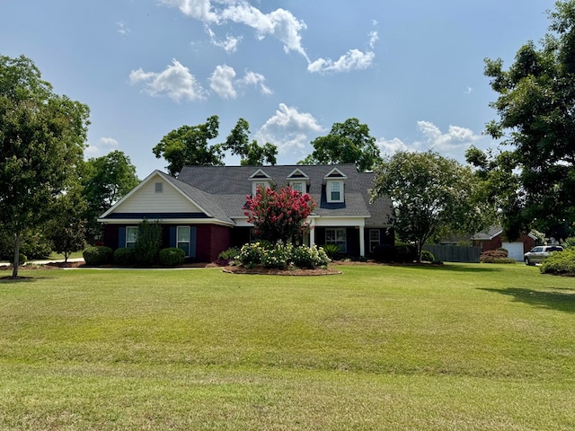 3854 Orchard Way, Valdosta, GA 31605 - cape cod home with a front lawn