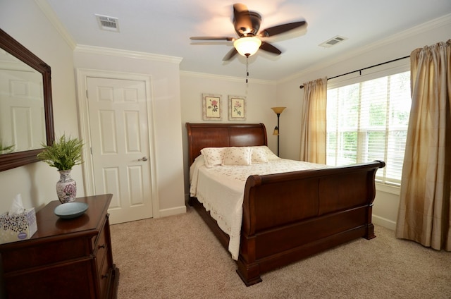 3854 Orchard Way, Valdosta, GA 31605 - bedroom featuring light carpet, multiple windows, ornamental molding, a ceiling fan, and baseboards