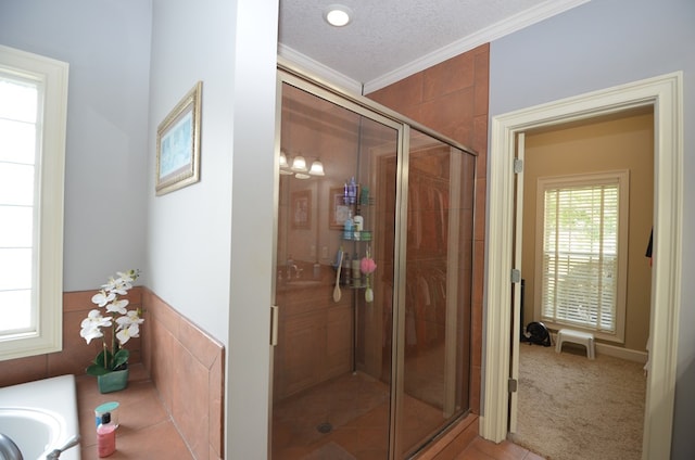 3854 Orchard Way, Valdosta, GA 31605 - full bath with crown molding, a stall shower, a sink, a bath, and a textured ceiling