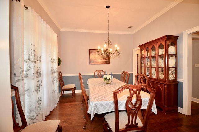 3854 Orchard Way, Valdosta, GA 31605 - dining room with wood finished floors, baseboards, crown molding, and a chandelier