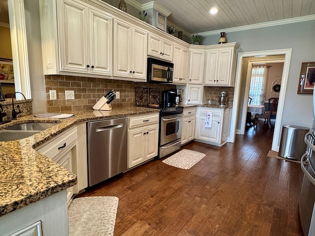 3854 Orchard Way, Valdosta, GA 31605 - kitchen featuring appliances with stainless steel finishes, a sink, light stone counters, backsplash, and ornamental molding