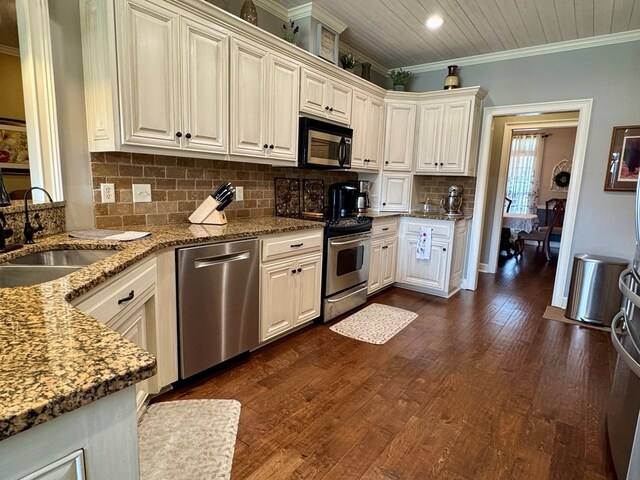 3854 Orchard Way, Valdosta, GA 31605 - kitchen featuring appliances with stainless steel finishes, a sink, light stone counters, backsplash, and ornamental molding