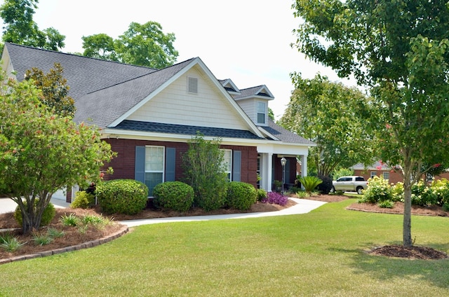 3854 Orchard Way, Valdosta, GA 31605 - view of front of house with a shingled roof and a front yard