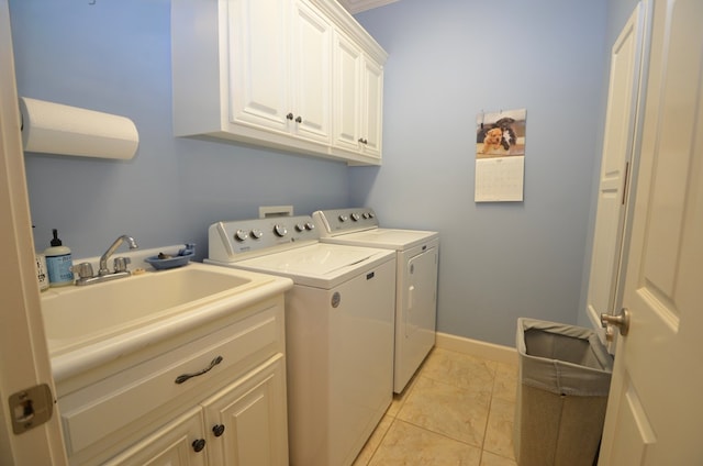 3854 Orchard Way, Valdosta, GA 31605 - laundry room featuring cabinet space, independent washer and dryer, light tile patterned floors, and baseboards