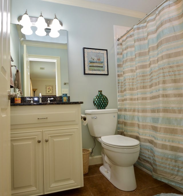 3854 Orchard Way, Valdosta, GA 31605 - full bath featuring ornamental molding, tile patterned floors, toilet, vanity, and baseboards