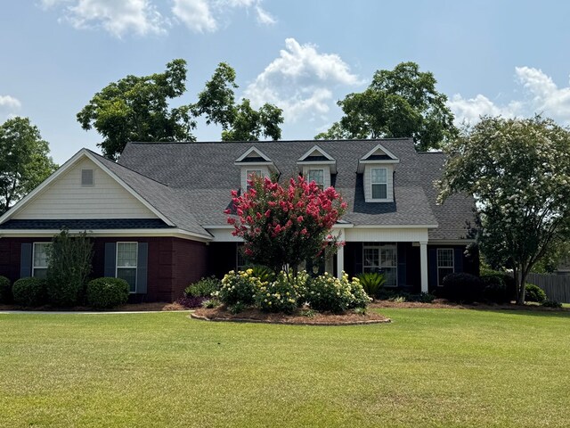 3854 Orchard Way, Valdosta, GA 31605 - view of front of property featuring a front yard and roof with shingles