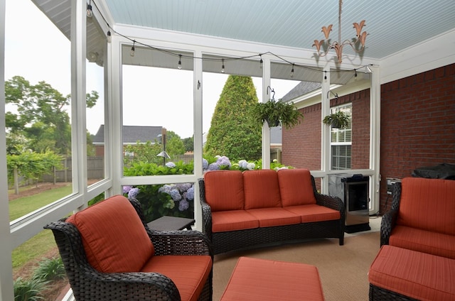 3854 Orchard Way, Valdosta, GA 31605 - sunroom with outdoor lounge area and a chandelier