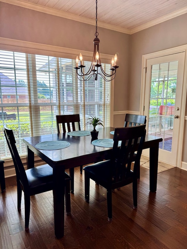 3854 Orchard Way, Valdosta, GA 31605 - dining space featuring a chandelier, crown molding, and dark wood-type flooring