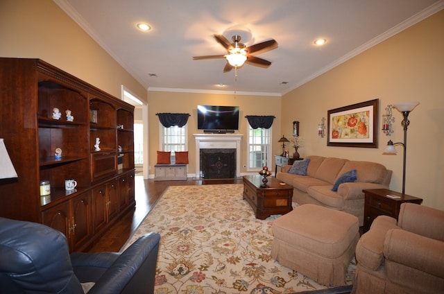 3854 Orchard Way, Valdosta, GA 31605 - living room with a ceiling fan, dark wood-type flooring, ornamental molding, a fireplace, and recessed lighting