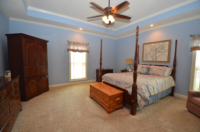 3854 Orchard Way, Valdosta, GA 31605 - bedroom featuring a raised ceiling, light colored carpet, ornamental molding, baseboards, and a ceiling fan