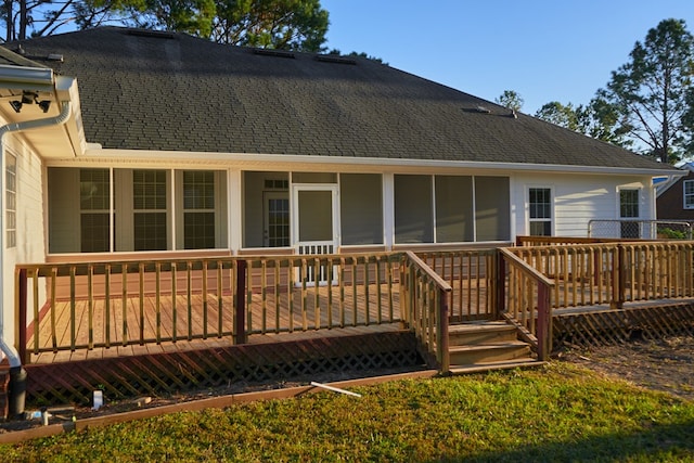 rear view of house with a deck