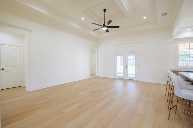 entryway featuring crown molding, wood-type flooring, and baseboards