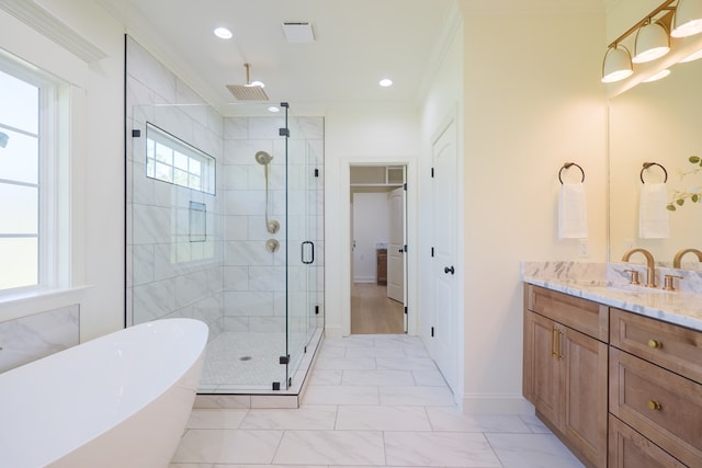 full bath featuring crown molding, a soaking tub, vanity, marble finish floor, and a stall shower