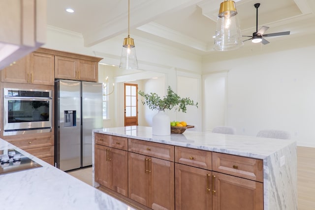 interior space with baseboards, a ceiling fan, and carpet floors