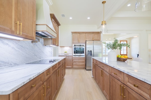 kitchen featuring tasteful backsplash, ornamental molding, custom exhaust hood, light stone counters, and stainless steel appliances