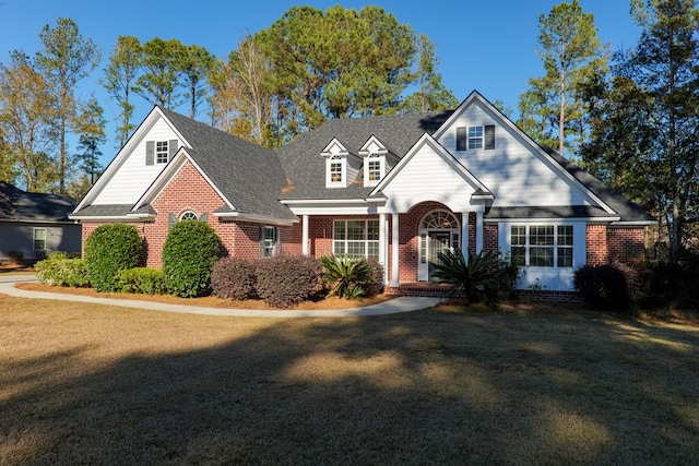 view of front of property with a front lawn