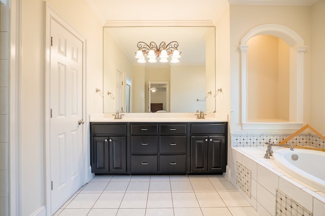 bathroom featuring a relaxing tiled tub, tile patterned floors, vanity, and crown molding