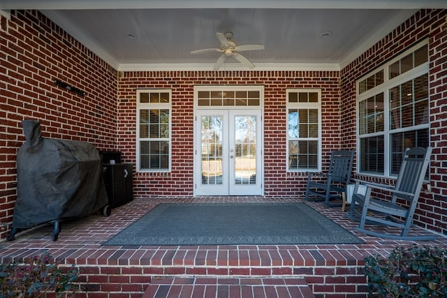 view of patio / terrace featuring ceiling fan, area for grilling, and french doors