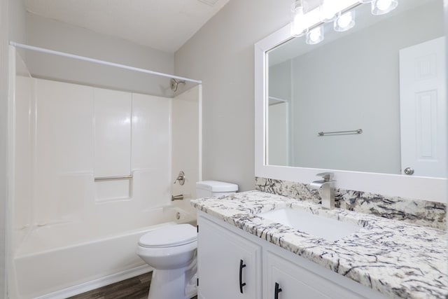 full bathroom with wood-type flooring, vanity, toilet, and shower / tub combination