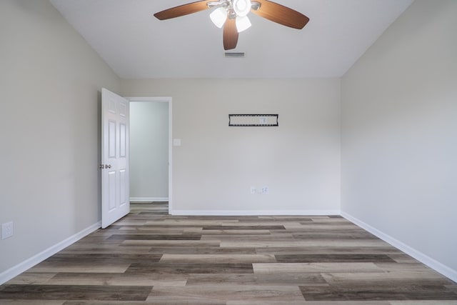 spare room with wood-type flooring, a textured ceiling, and ceiling fan