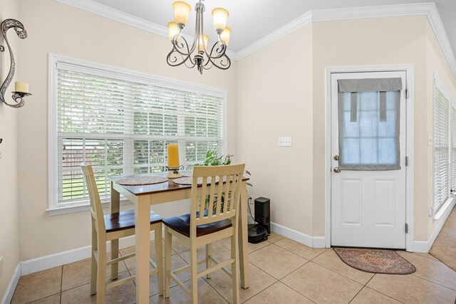 5221 Carys Brook Dr, Hahira, GA 31632 - dining space featuring a chandelier, ornamental molding, and light tile patterned floors
