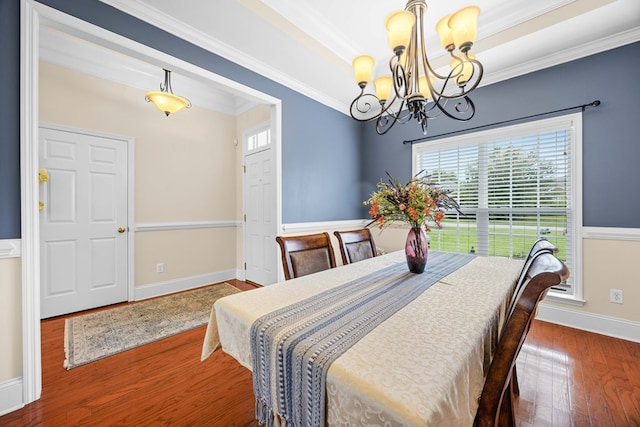 5221 Carys Brook Dr, Hahira, GA 31632 - dining area with a chandelier, wood finished floors, and ornamental molding