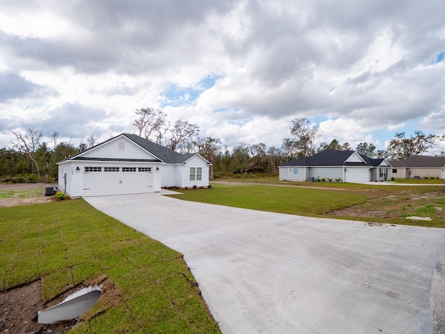 ranch-style house featuring cooling unit, a front lawn, and a garage