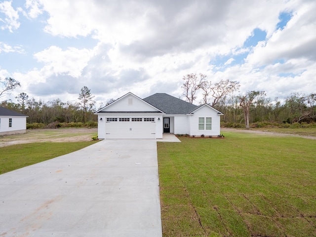 ranch-style home featuring a front yard and a garage