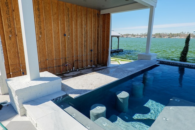 view of patio featuring a water view