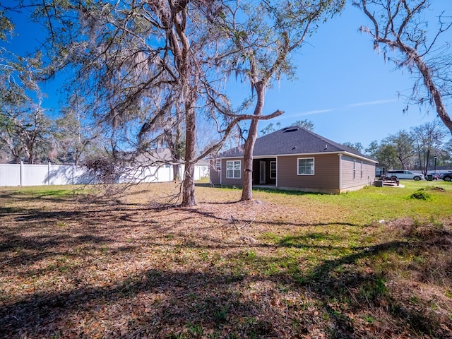 view of yard with fence