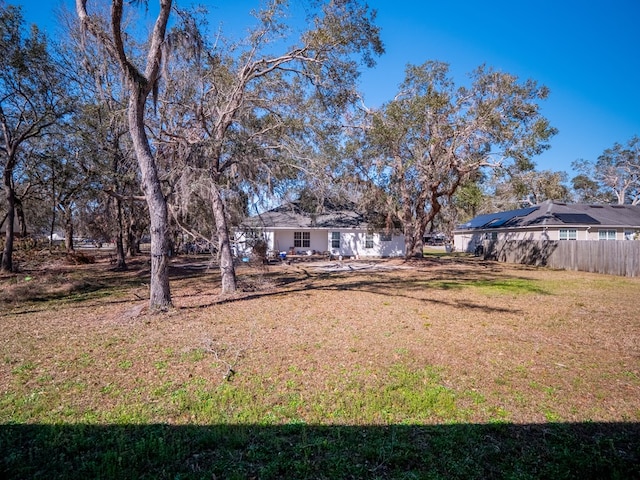 view of yard with fence