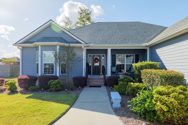 view of front facade featuring a front yard