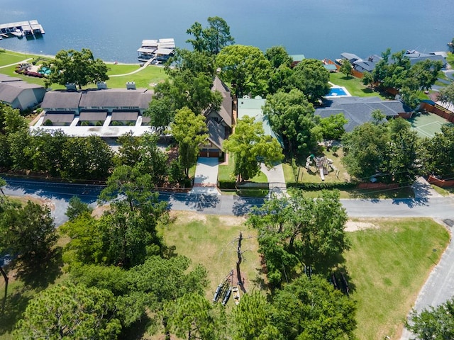 birds eye view of property with a water view