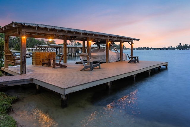 dock area with a water view