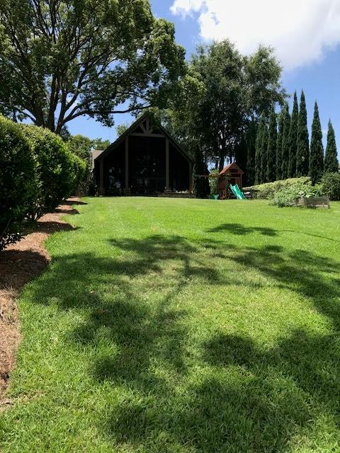 view of yard with a playground