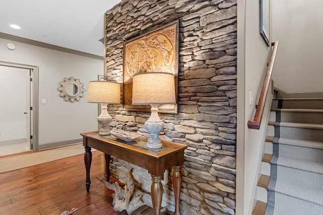 interior space with crown molding and hardwood / wood-style floors