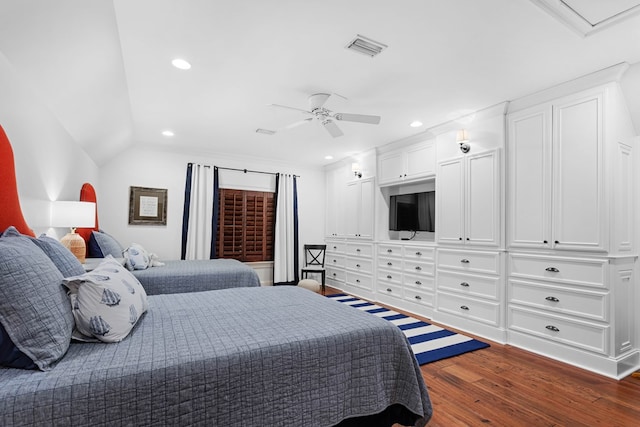 bedroom featuring dark wood-type flooring, ceiling fan, and lofted ceiling