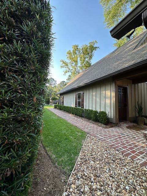 view of property exterior with a patio